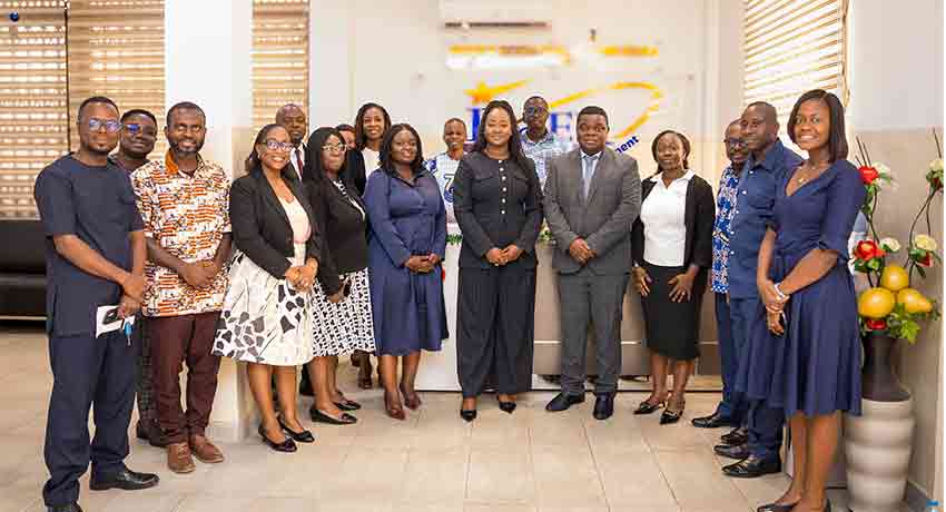 Group photo of ISSER faculty and staff with Ecobank representatives, underscoring the collaborative effort and institutional support that will drive the success of the agreement.